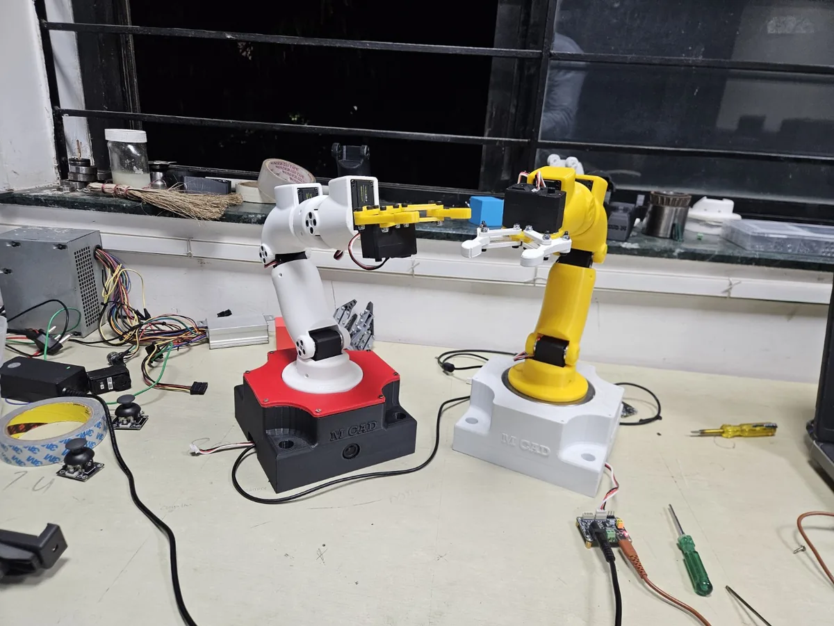 M CAD Solutions Dexter robotic arms used as a practical robotics training reference